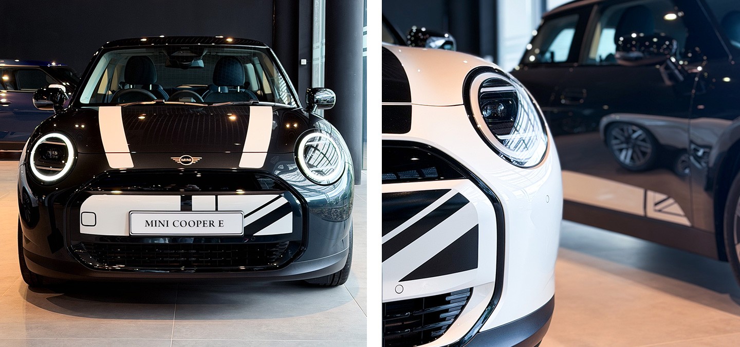 Front view of the MINI Cooper in Nanuq White with Black Roof parking.